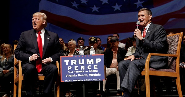 President-elect Donald Trump and retired General Michael Flynn speak at an event.
