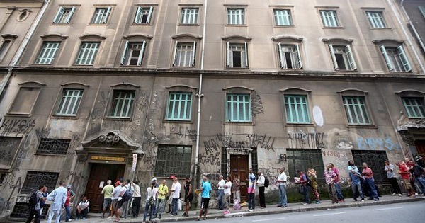 Unemployed people line up in front of a charity house in downtown Sao Paulo, Brazil.