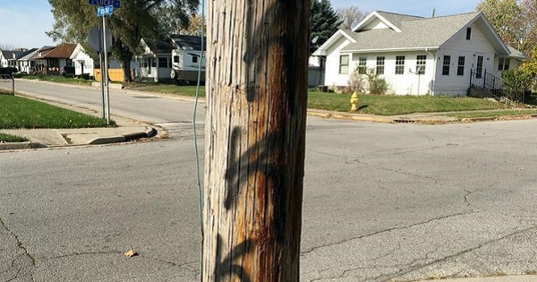 “KKK” is shown spray painted on a telephone pole in Kokomo, Indiana, U.S.