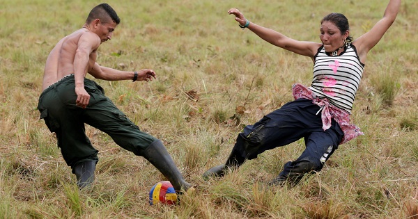 Two members of the FARC play soccer during the 10th Guerrilla Conference in Llanos del Yari, Colombia. Sept. 17, 2016.