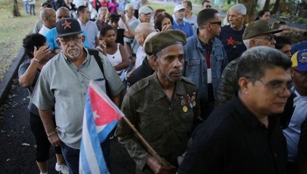 People stand in line to pay tribute to Cuba's late President Fidel Castro in Revolution Square in Havana, Nov. 28, 2016. 