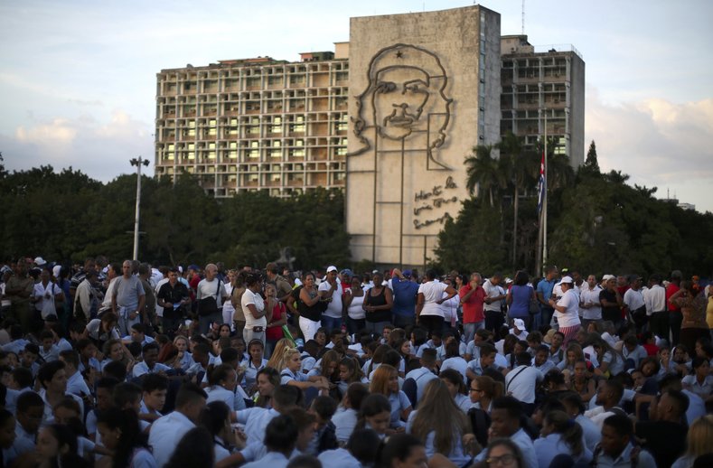 Mourners gather to pay tribute to Cuba's late President Fidel Castro at Revolution Square in Havana.