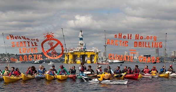 Activists demonstrate in Seattle's Elliot Bay against the arrival of Shell's massive Polar Pioneer oil rig in 2015.