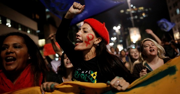 Women shout slogans as they march in support of former President Dilma Rousseff in Sao Paulo, May 17, 2016.