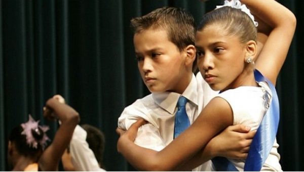 Children performing the rumba in a ballroom dance competition in New York City in 2005.