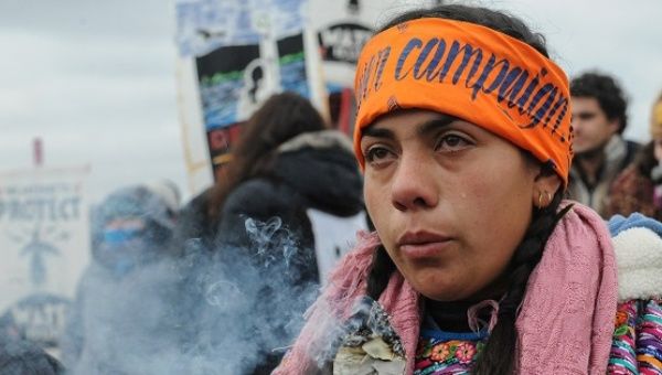 A protester cries during a protest against plans to pass the Dakota Access pipeline near the Standing Rock Indian Reservation, North Dakota.