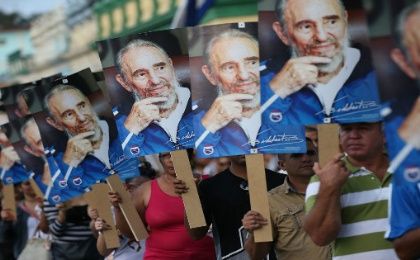 People greet the arrival of the caravan carrying the ashes of Fidel Castro in Las Tunas, Cuba on Dec. 2, 2016.