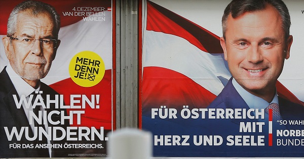 Presidential election campaign posters of Alexander Van der Bellen and of Norbert Hofer are seen in Vienna, Austria, Nov. 24, 2016.