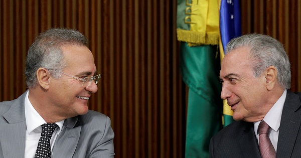 Senate President Renan Calheiros speaks with Brazil's President Michel Temer during a meeting with governors at the Planalto Palace in Brasilia, Nov. 22, 2016.