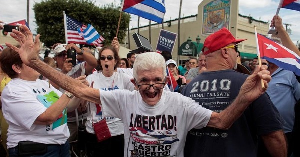 People celebrate the death of Cuban revolutionary leader Fidel Castro in Miami, Florida, U.S., Nov. 26, 2016.