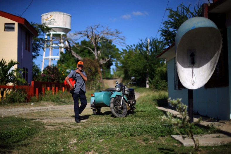 A man walks near the estate where Cuba's former President Fidel Castro was born, in Biran.