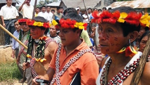 Achuar people living in the remote headwaters of the Amazon are threatened by oil exploration.