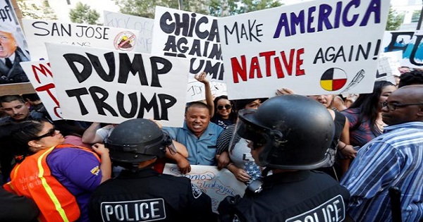 Demonstrators outside a campaign rally for Republican U.S. presidential candidate Donald Trump in San Jose, CA, U.S., June 2, 2016.