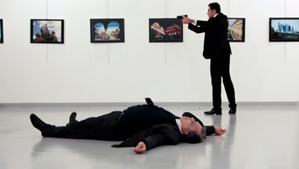 Russian Ambassador to Turkey Andrei Karlov lies on the ground after he was shot by unidentified man at an art gallery in Ankara, Turkey, Dec. 19, 2016. 