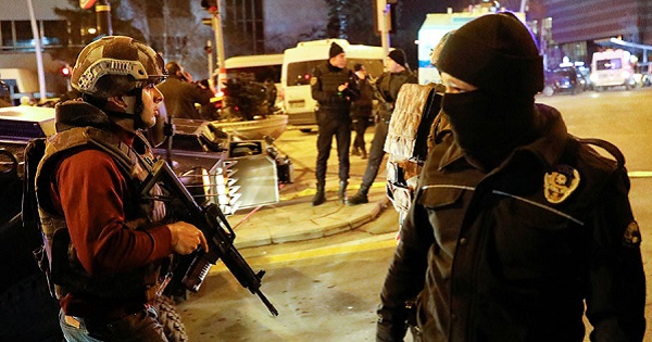 Police secure the area outside Ankara's U.S. embassy after man shoots shotgun into the air.