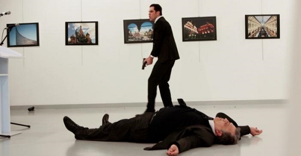 Russian Ambassador to Turkey Andrei Karlov lies on the ground after he was shot by Mevlut Mert Altintas at an art gallery in Ankara, Turkey.