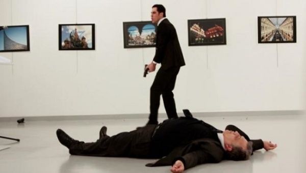 Russian Ambassador to Turkey Andrei Karlov lies on the ground after he was shot by Mevlut Mert Altintas at an art gallery in Ankara, Turkey. 