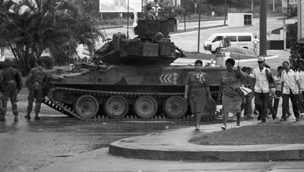 A tank patrols Panama City after the 1989 U.S. invasion of Panama.