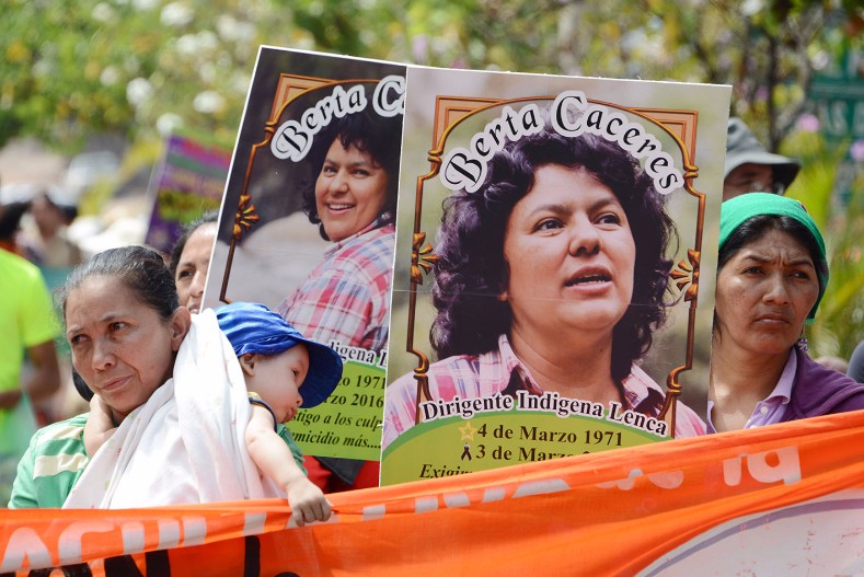 Renowned environmental and Indigenous leader Berta Caceres was shot dead in her home March 2, 2016 after standing up to private corporations and neoliberal policies exploiting Lenca land in Western Honduras. Berta's family is still fighting for justice.