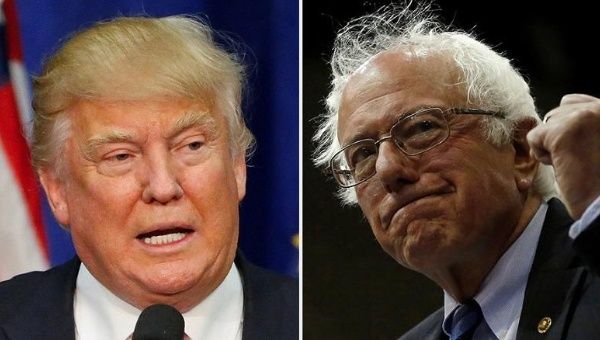 U.S. President-elect Donald Trump (L) and former Democratic U.S. presidential candidate Bernie Sanders (R)