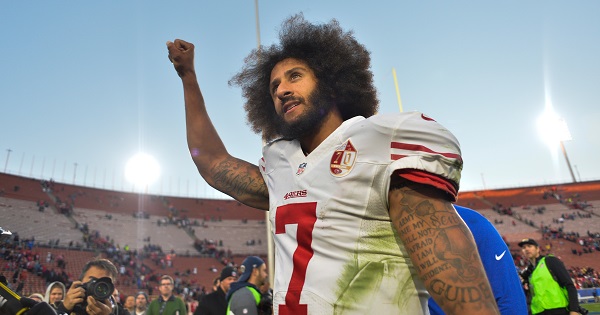 San Francisco 49ers quarterback Colin Kaepernick pumps his fist as he acknowledges the cheers from fans.