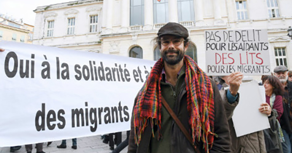 Cedric Herrou, with supporters, outside the courthouse in Nice, France. Jan. 4, 2016