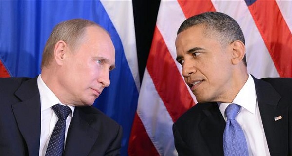 U.S. President Barack Obama (R) listens to Russian President Vladimir Putin at a meeting on the sidelines of the G20 summit in Los Cabos, Mexico, on June 18, 2012.