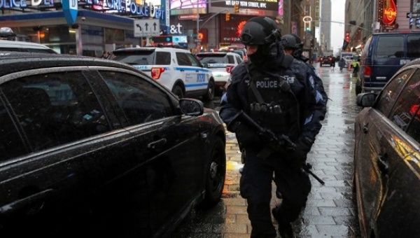 New York Police Department's Counterterrorism Bureau officers patrol Times Square in the lead-up to New Year's celebrations in Manhattan, New York City.