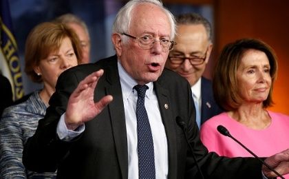 Bernie Sanders speaks to reporters about Republicans' effort to repeal the Affordable Care Act on Capitol Hill in Washington, Jan. 4, 2017. 