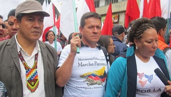 Huber Ballesteros (C) at an agrarian march in Colombia