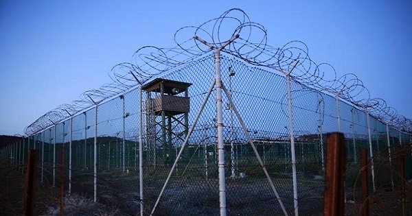 Chain link fence and wire surrounds a deserted guard tower in Joint Task Force Guantanamo's Camp Delta at the U.S. Naval Base in Guantanamo Bay, Cuba March 21, 2016.