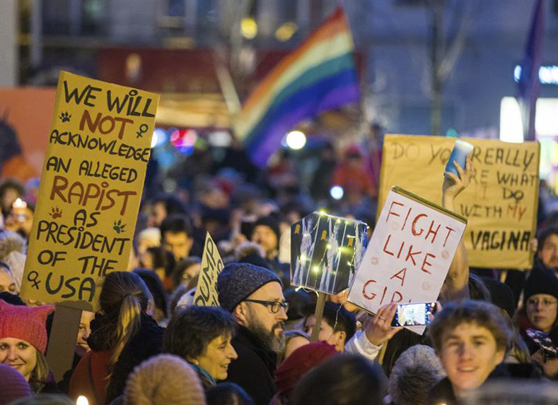 Feminist protesters denounce Trump in Brussels, Belgium, Jan. 20, 2017.