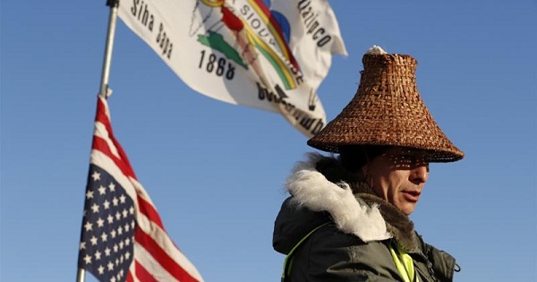 Activist Hugh Ahnatock of the Inupiaq tribe pauses after singing as demonstrations continued against pipeline project adjacent to the Standing Rock Indian Reservation, N Dakota, December 4