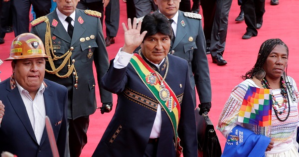 Bolivia's President Evo Morales waves during a ceremony to mark 11 years of his administration in La Paz, Bolivia, Jan. 22, 2017.