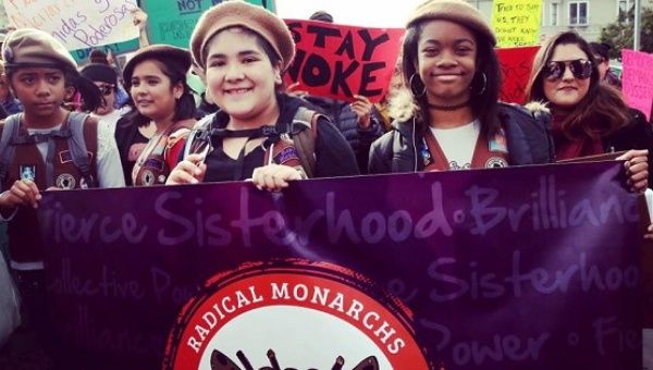 Members of the Radical Monarchs girls troop join the Women’s March in Oakland.