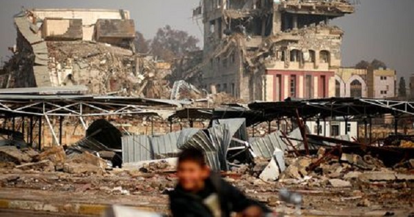 Buildings destroyed during previous clashes are seen as Iraqi forces battle with Islamic State militants in Mosul, Iraq.