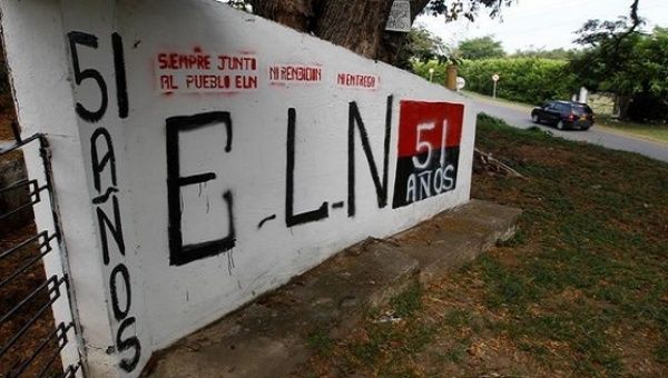 ELN grafitti is seen at the entrance of the cemetery of El Palo, Cauca, Colombia.