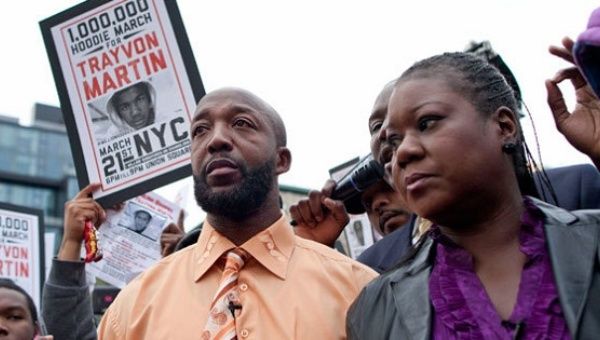 Trayvon Martin's parents at a rally on his behalf