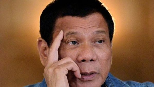 Philippine President Rodrigo Duterte speaks during a late night news conference at the presidential palace in Manila, Philippines, Jan. 29, 2017. 