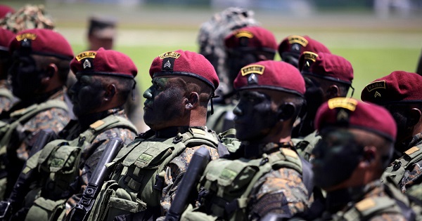 Kaibiles, members of an elite group of the Guatemalan army, take part in a military parade during Army Day celebrations, at the Air Force headquarters in Guatemala City, Guatemala, July 3, 2016.