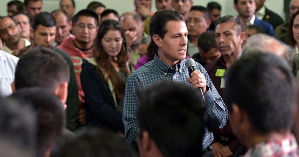 Enrique Peña Nieto speaking with Mexican migrants deported from the United States, Tuesday, Feb. 7, 2017, Mexico City.
