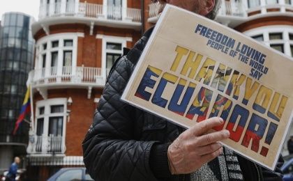 A supporter of Julian Assange outside the Embassy of Ecuador in London June 24, 2013. 