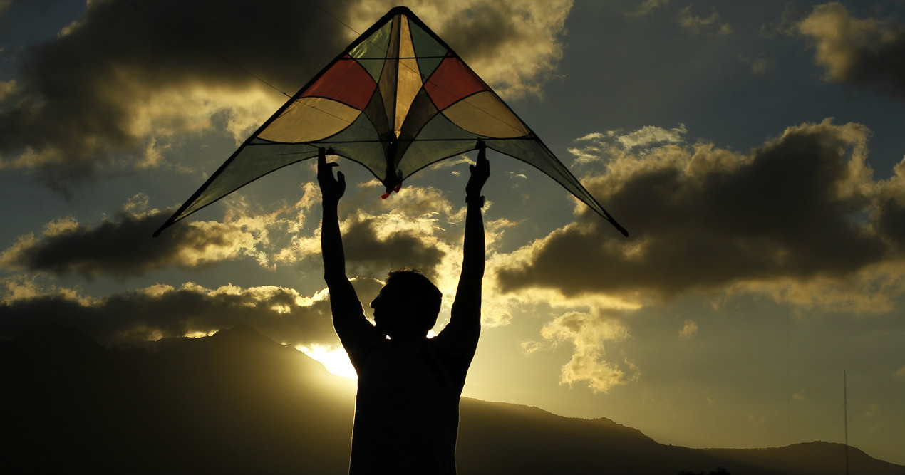 A man flies a kite at the Peace Park in San José, Costa Rica.