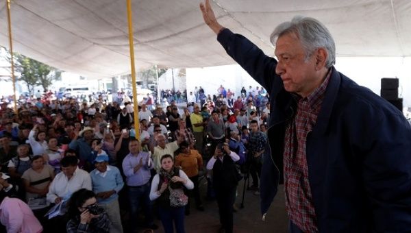 Andres Manuel Lopez Obrador, leader of the Morena party, waves after giving a speech to supporters in Tlapanoloya, Mexico, Jan. 25, 2017. 