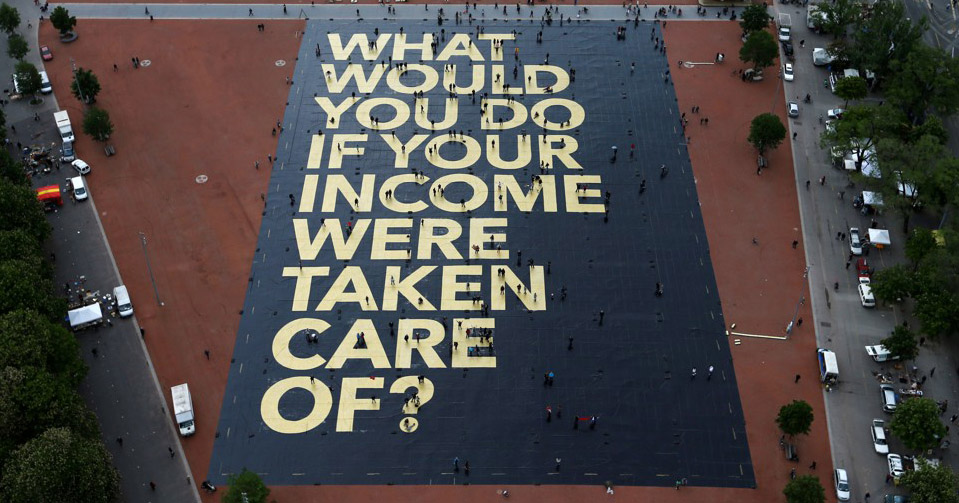 A large poster in a square in Geneva, Switzerland, promoting the idea of a universal basic income
