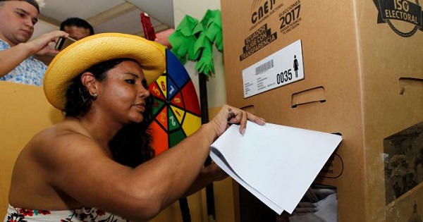 Diane Rodriguez, a member of the Ecuadorean transgender community, casts her vote during the presidential election in Guayaquil, Ecuador Feb. 19, 2017.