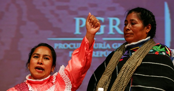 Jacinta Francisco, one of three Indigenous women who were wrongfully jailed for years, stands next to her daughter Estela Hernadez as she shouts slogans.