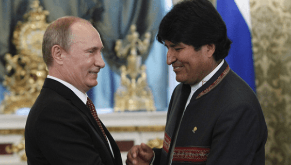 Russian President Vladimir Putin greets Bolivian President Evo Morales during a 2013 meeting at the Kremlin.