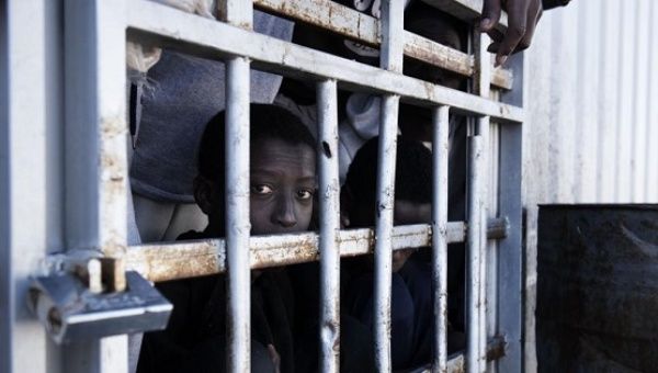 A child refugee at a detention center in Libya. 