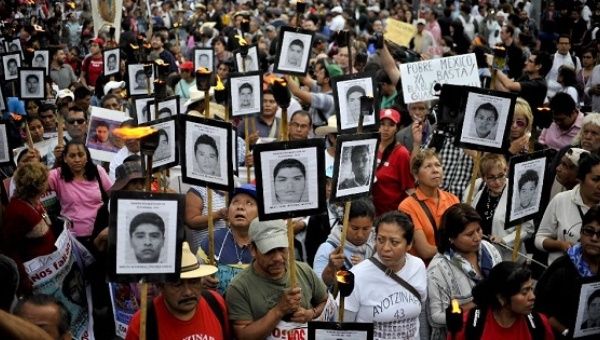 Parents of the 43 disappeared Ayotzinapa students demonstrate in Mexico City, Mexico. April, 2016